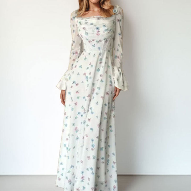 Kvinnors Elegant Maxi Klänning med Blommiga Applikationer och Voluminösa Ärmar Mirla-Eva Jonsson