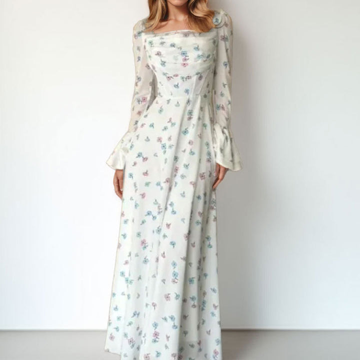 Kvinnors Elegant Maxi Klänning med Blommiga Applikationer och Voluminösa Ärmar Mirla-Eva Jonsson