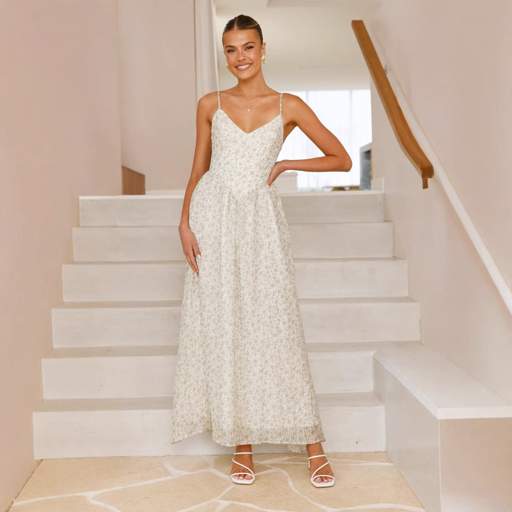 Kvinnors Elegant Maxi Klänning med Fint Blommönster och Delikata Spaghettistroppar Mirla-Eva Jonsson