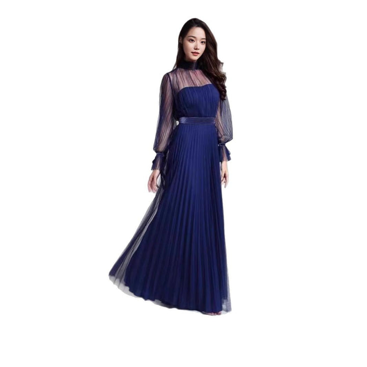 Kvinnors Elegant Maxi Klänning med Glittrande Chiffon och Lekfulla Volang Detaljer-Eva Jonsson