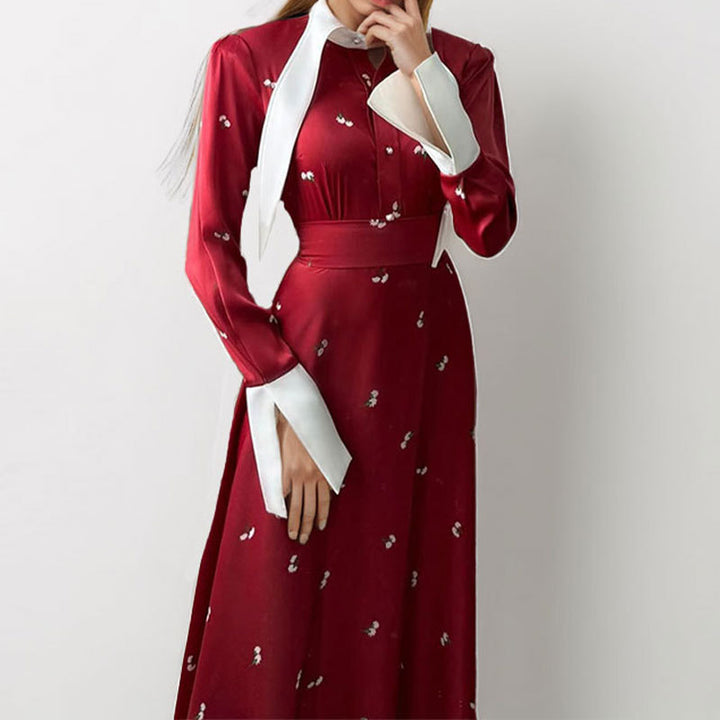 Kvinnors Elegant Maxi Klänning med Konstnärlig Drapering och Långa Ärmar Mirla-Eva Jonsson