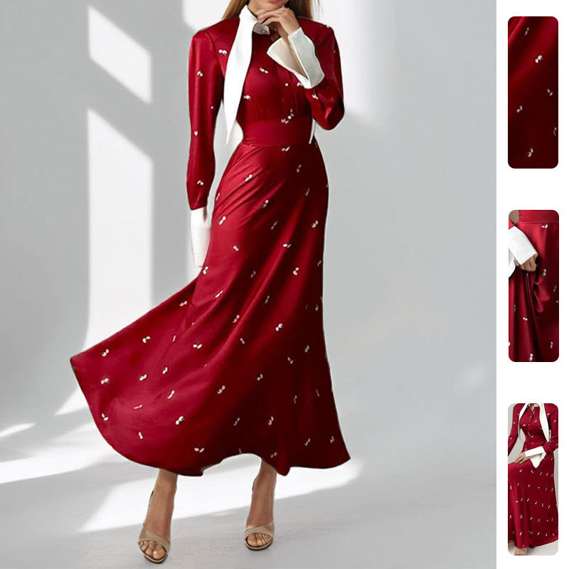 Kvinnors Elegant Maxi Klänning med Konstnärlig Drapering och Långa Ärmar Mirla-Eva Jonsson