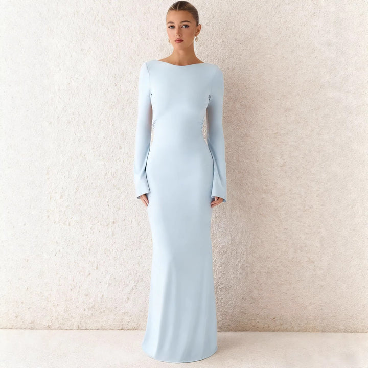 Kvinnors Elegant Maxi Klänning med Långa Ärmar och Flödande Kjol Mirla-Eva Jonsson