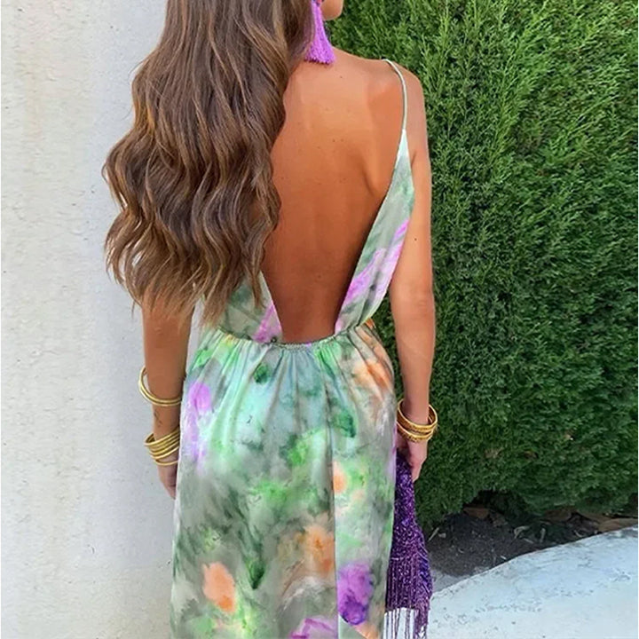 Kvinnors Elegant Maxi Klänning med Lekfull Skärning och Transparenta Ärmar Mirla-Eva Jonsson