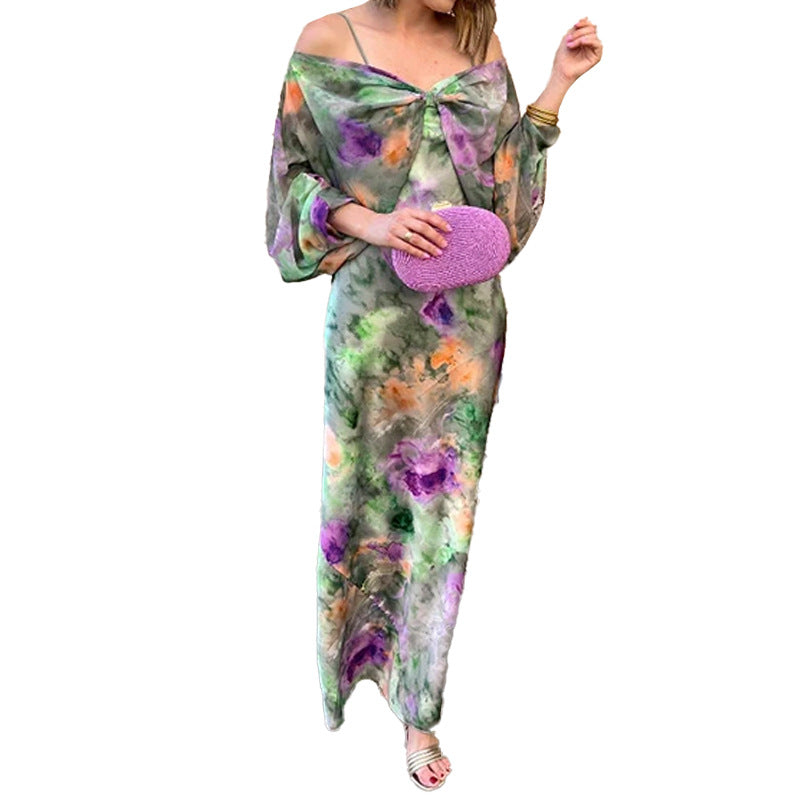 Kvinnors Elegant Maxi Klänning med Lekfull Skärning och Transparenta Ärmar Mirla-Eva Jonsson