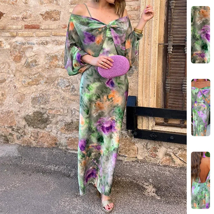 Kvinnors Elegant Maxi Klänning med Lekfull Skärning och Transparenta Ärmar Mirla-Eva Jonsson