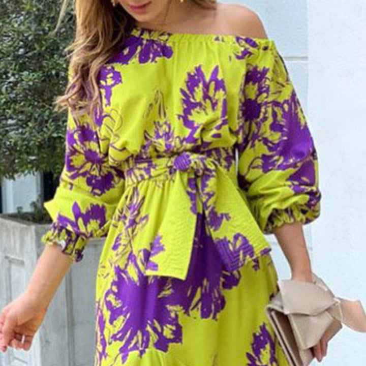 Kvinnors Elegant Maxi Klänning med Off-Shoulder Design och Volang Detaljer Mirla-Eva Jonsson
