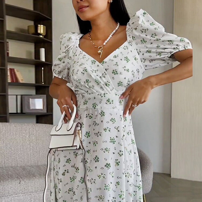 Kvinnors Elegant Maxi Klänning med Puffärmar och Blommönster Mirla-Eva Jonsson