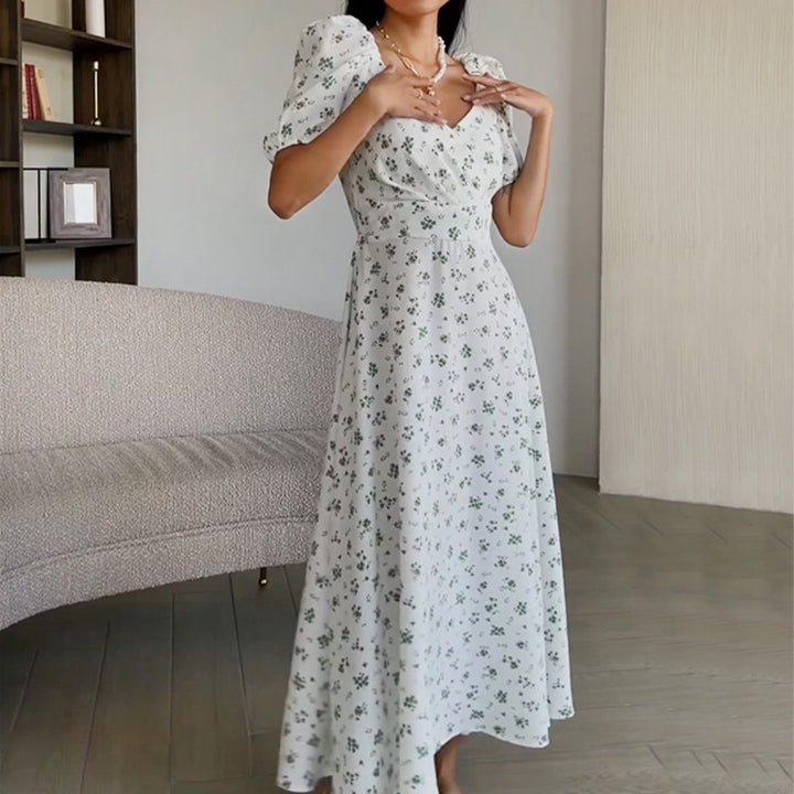 Kvinnors Elegant Maxi Klänning med Puffärmar och Blommönster Mirla-Eva Jonsson