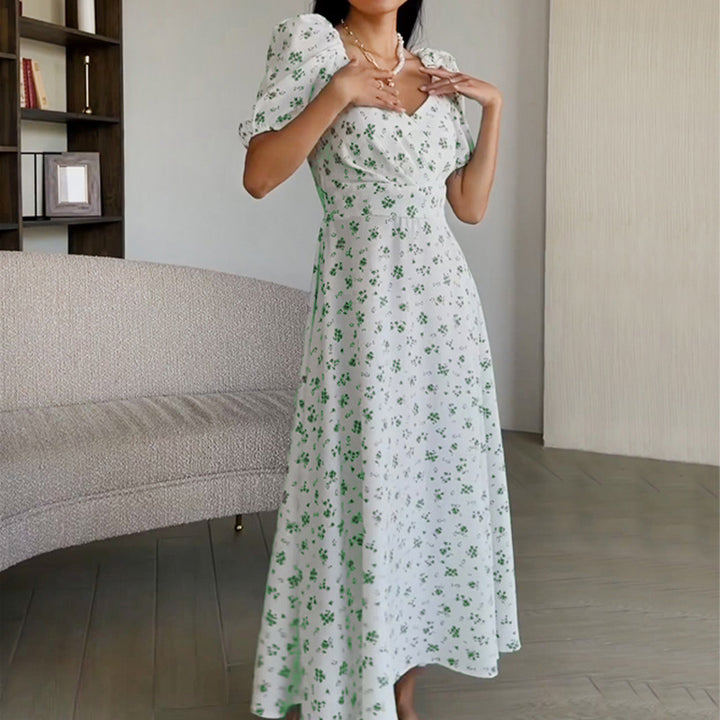 Kvinnors Elegant Maxi Klänning med Puffärmar och Blommönster Mirla-Eva Jonsson