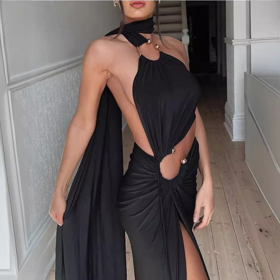 Kvinnors Elegant Maxi Klänning med Spännande Sprund och Sensuell Halterneck Mirla-Eva Jonsson