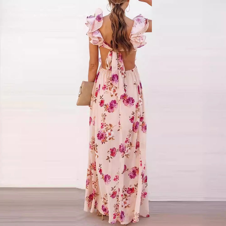 Kvinnors Elegant Maxi Klänning med Volangdetaljer och Blommönster-Eva Jonsson