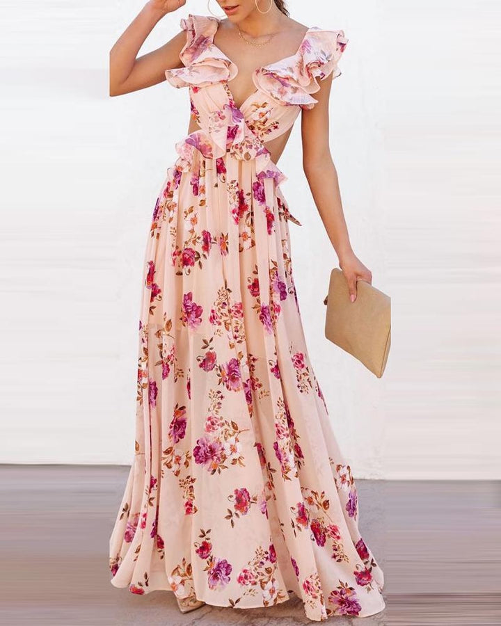 Kvinnors Elegant Maxi Klänning med Volangdetaljer och Blommönster-Eva Jonsson