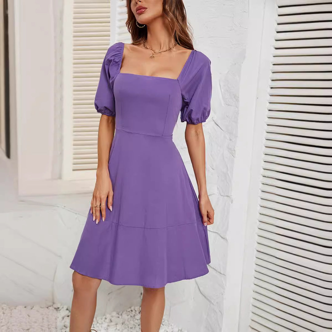 Kvinnors Elegant Off-Shoulder Klänning med Voluminösa Puffärmar och Asymmetrisk Klipp-Eva Jonsson