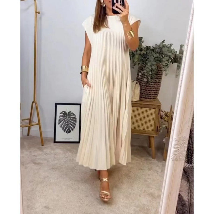 Kvinnors Elegant Plisserad Maxi Klänning med Praktiska Fickor Mirla-Eva Jonsson