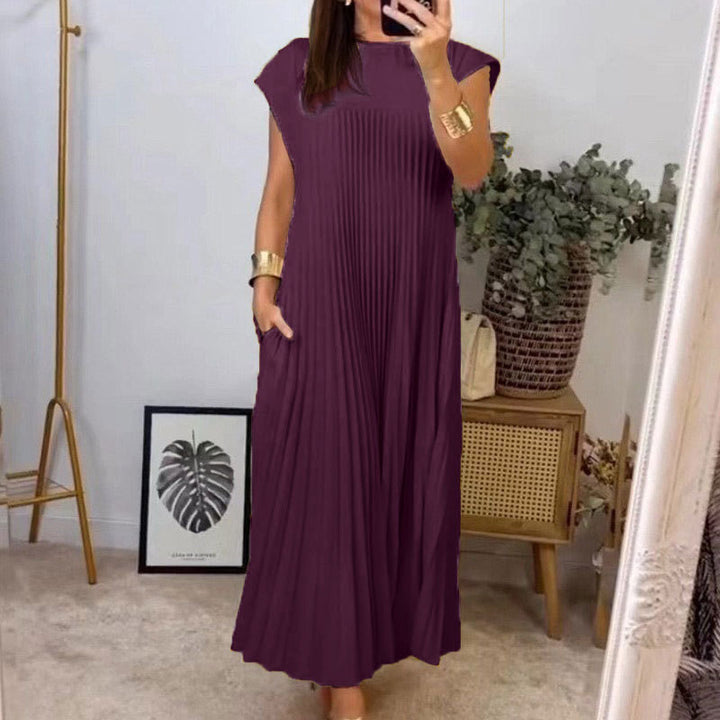 Kvinnors Elegant Plisserad Maxi Klänning med Praktiska Fickor Mirla-Eva Jonsson