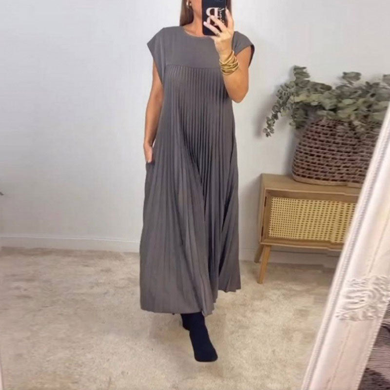 Kvinnors Elegant Plisserad Maxi Klänning med Praktiska Fickor Mirla-Eva Jonsson