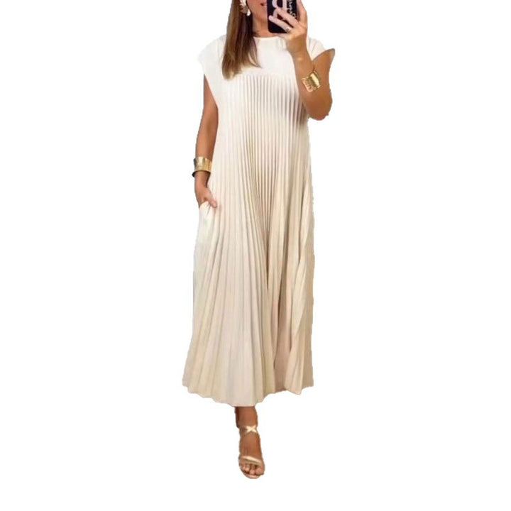 Kvinnors Elegant Plisserad Maxi Klänning med Praktiska Fickor Mirla-Eva Jonsson