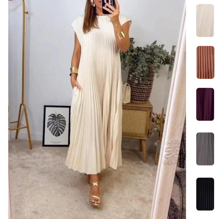 Kvinnors Elegant Plisserad Maxi Klänning med Praktiska Fickor Mirla-Eva Jonsson
