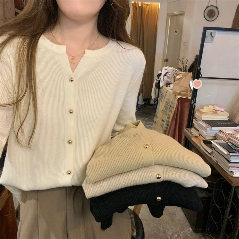 Kvinnors Elegant Stickad Cardigan med Knappar och Fin Ribbad Struktur Mirla-Eva Jonsson