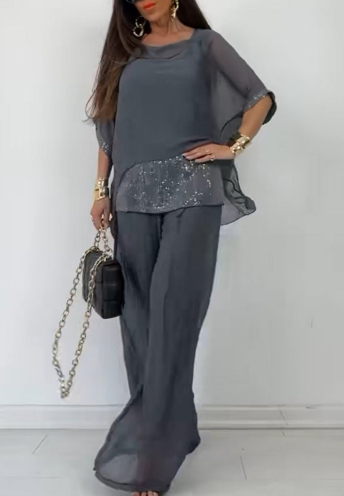 Kvinnors Elegant Tvådelad Byxdress med Glittrande Topp Mirla-Eva Jonsson