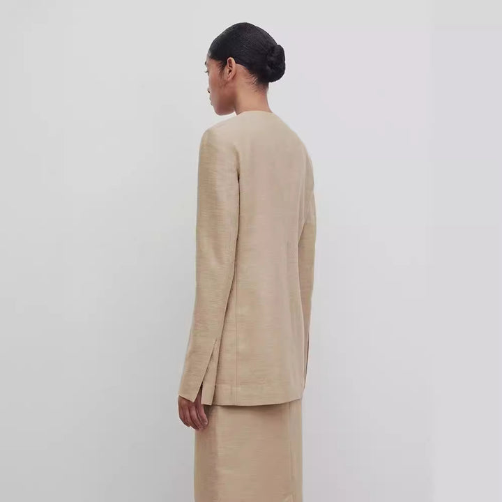 Kvinnors Elegant och Strukturerad Blazer med Minimalistisk Knapplist Mirla-Eva Jonsson