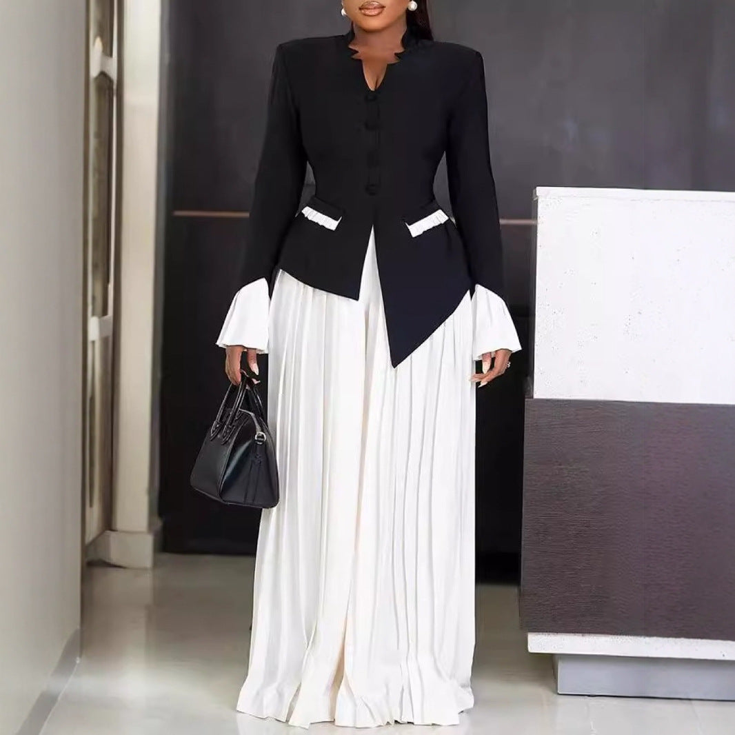 Kvinnors Fållad Maxiklänning med Strukturerad Blazer och Eleganta Accenter Mirla-Eva Jonsson