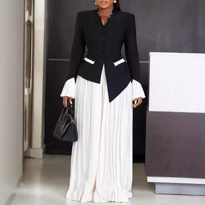 Kvinnors Fållad Maxiklänning med Strukturerad Blazer och Eleganta Accenter Mirla-Eva Jonsson