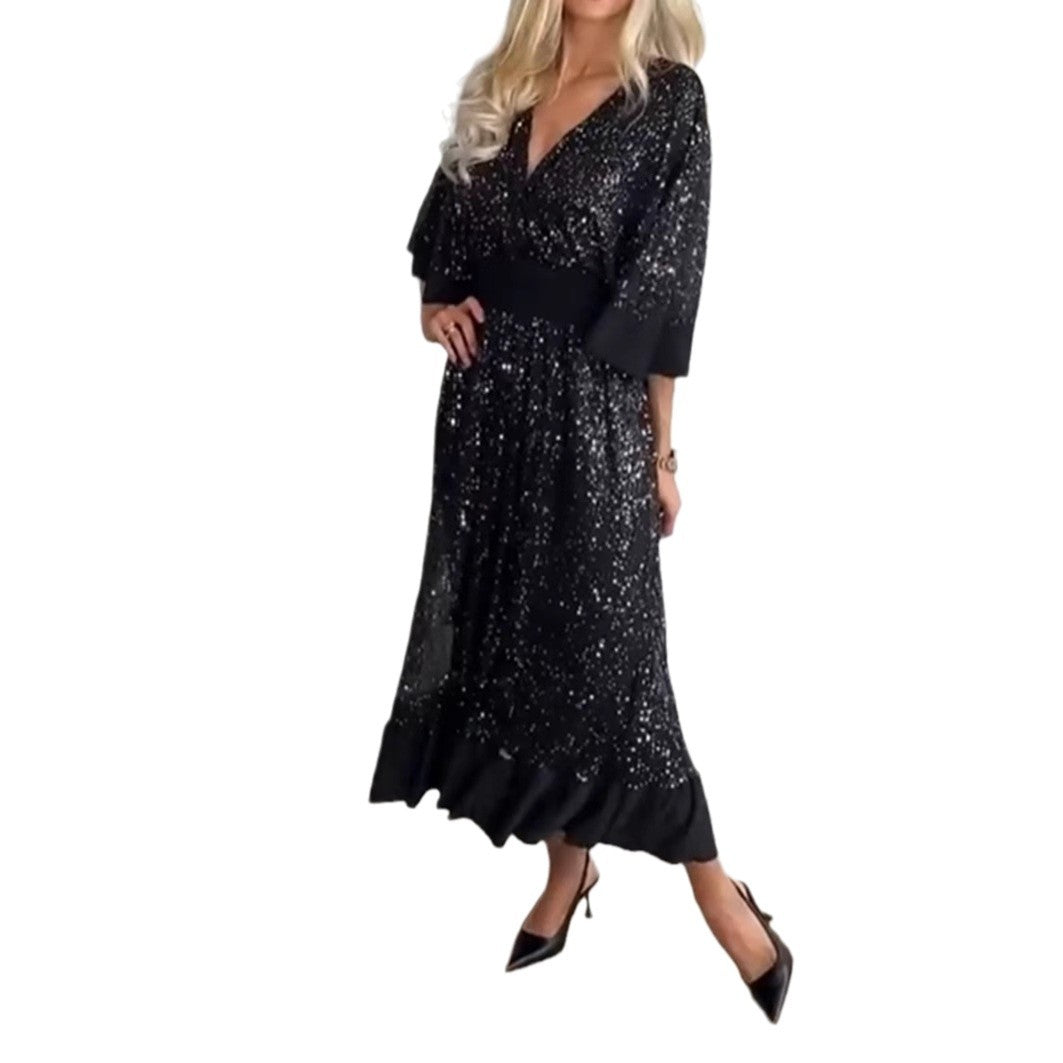 Kvinnors Glamorous Kvällsklänning med Glittrande Accenter och Voluminösa Ärmar Mirla-Eva Jonsson