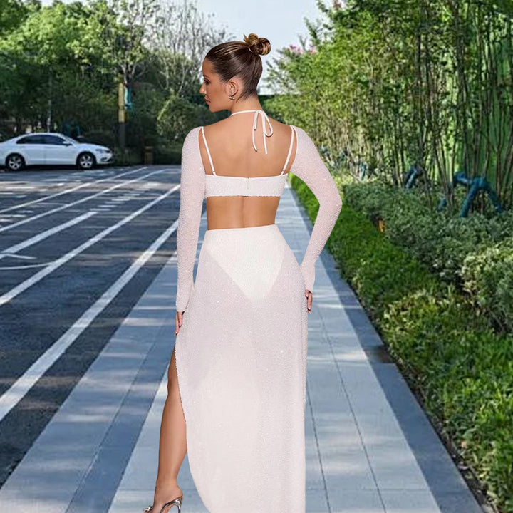 Kvinnors Glamorous Maxi Klänning med Glittrande Detaljer och Sidslits Mirla-Eva Jonsson