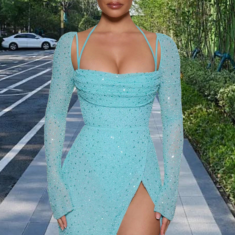 Kvinnors Glamorous Maxi Klänning med Glittrande Detaljer och Sidslits Mirla-Eva Jonsson