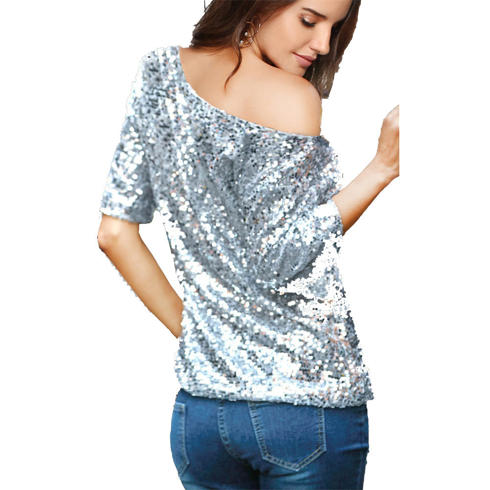 Kvinnors Glittrande Topp med Off-Shoulder Design och Paillettkanter-Eva Jonsson