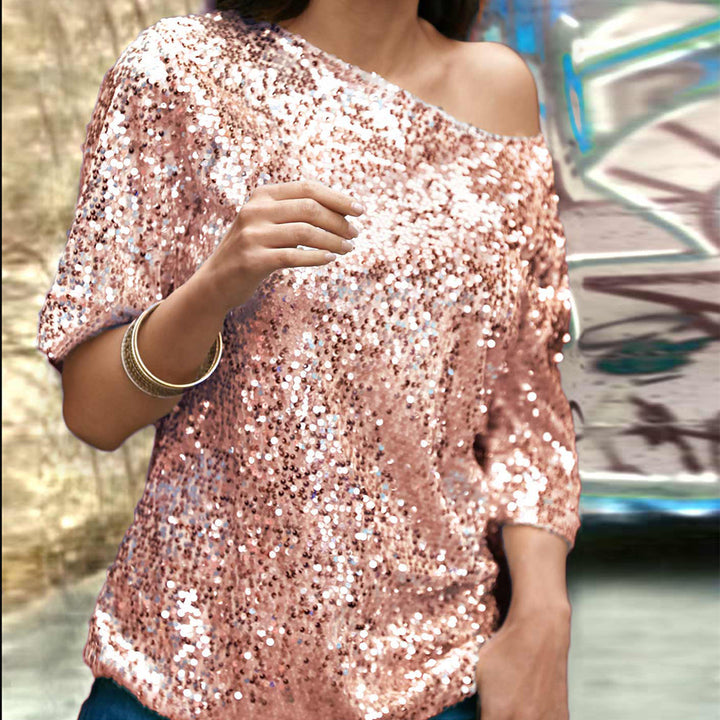Kvinnors Glittrande Topp med Off-Shoulder Design och Paillettkanter-Eva Jonsson