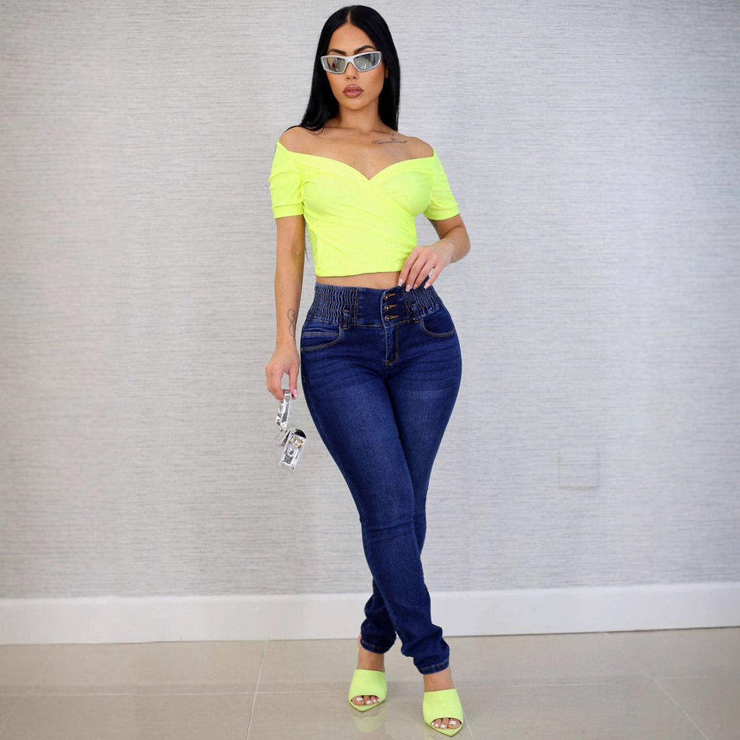 Kvinnors Högmidjade Skinny Jeans med Elastisk Midja och Dekorativa Knappar Mirla-Eva Jonsson