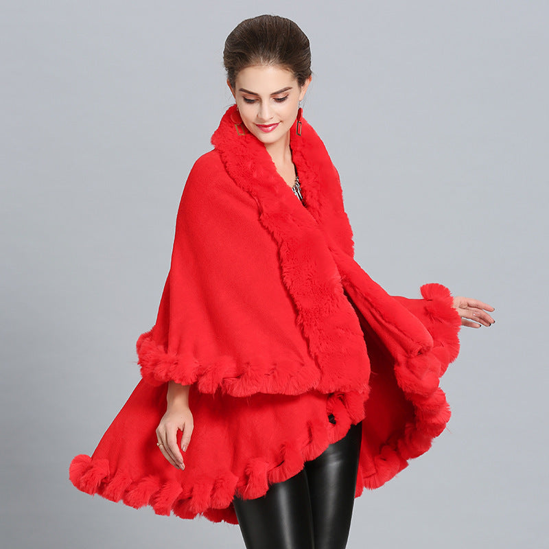Kvinnors Huva Poncho med Lyxig Pälskrage och Elegant Kantning Mirla-Eva Jonsson
