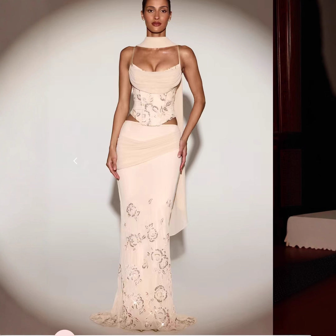 Kvinnors Korsettklänning med Blommönster och Elegant Flödande Kjol Mirla-Eva Jonsson