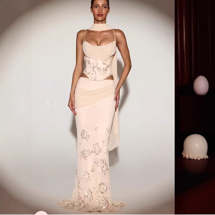 Kvinnors Korsettklänning med Blommönster och Elegant Flödande Kjol Mirla-Eva Jonsson