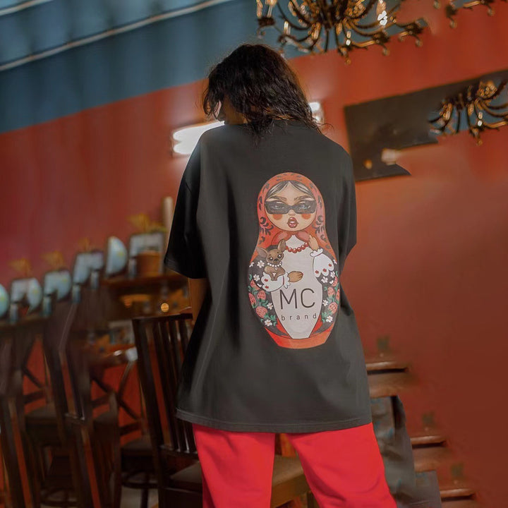 Kvinnors Kreativa Oversized T-Shirt med Funkig Grafisk Tryck Mirla-Eva Jonsson