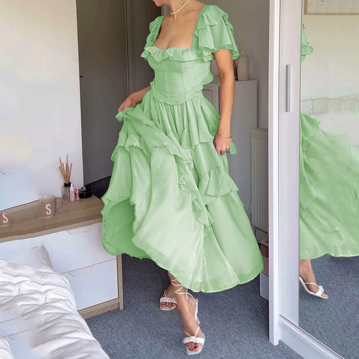 Kvinnors Lekfulla Volangdetalj Maxi Klänning med Korsett-Formad Topp-Eva Jonsson