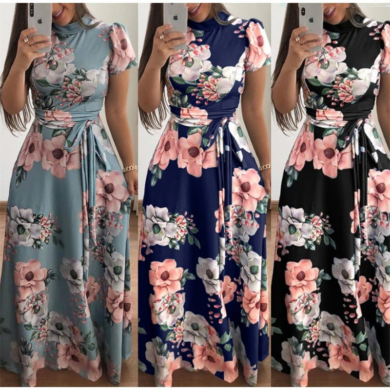 Kvinnors Maxi Klänning med Elegant Blommig Omslagsdesign och Kurvförstärkande Skärning Mirla-Eva Jonsson