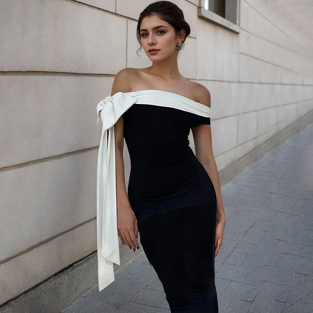 Kvinnors Maxi Klänning med chic off-shoulder design och elegant rosett accent Mirla-Eva Jonsson