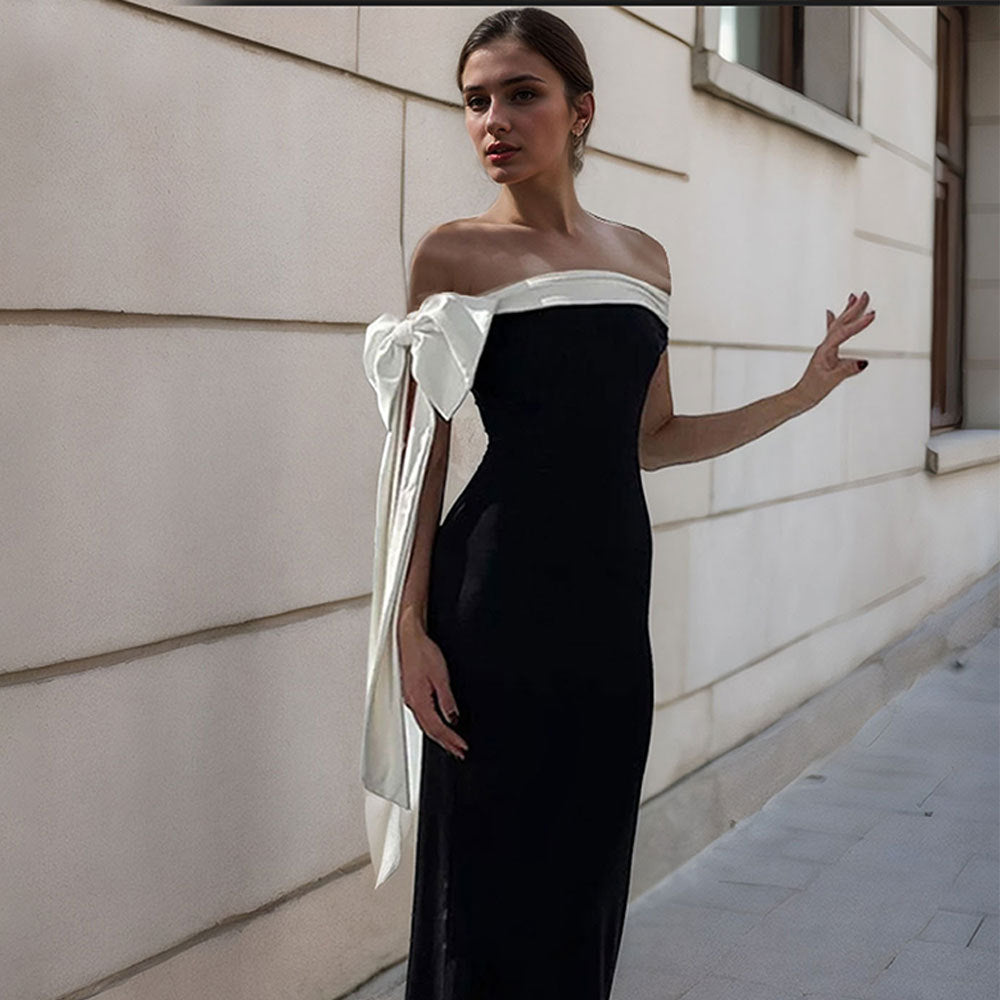 Kvinnors Maxi Klänning med chic off-shoulder design och elegant rosett accent Mirla-Eva Jonsson