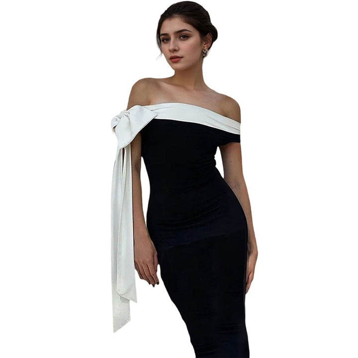 Kvinnors Maxi Klänning med chic off-shoulder design och elegant rosett accent Mirla-Eva Jonsson