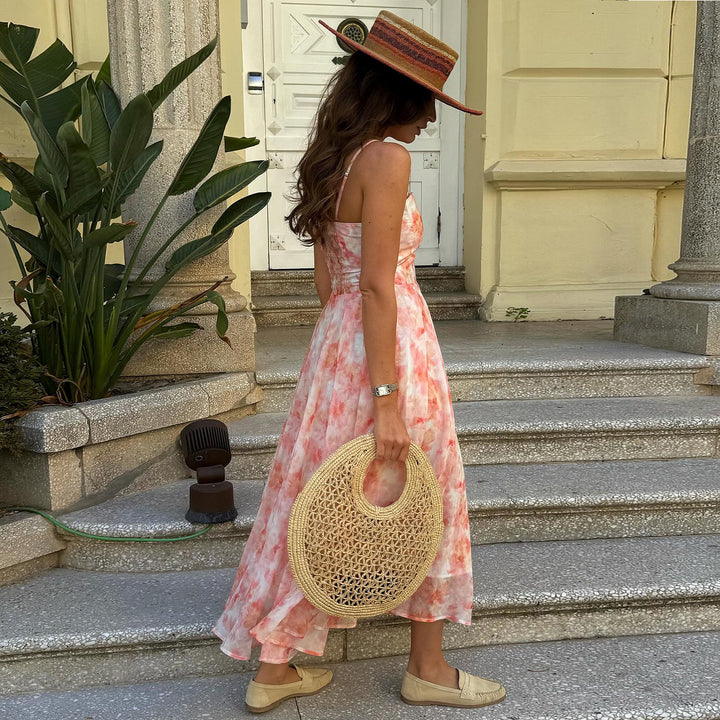 Kvinnors Maxi Klänning med elegant drapering och romantiskt blommönster Mirla-Eva Jonsson