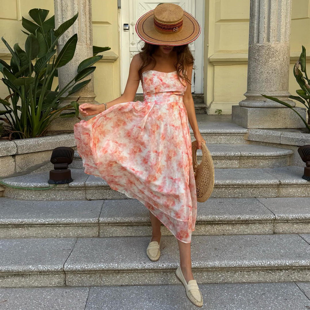 Kvinnors Maxi Klänning med elegant drapering och romantiskt blommönster Mirla-Eva Jonsson
