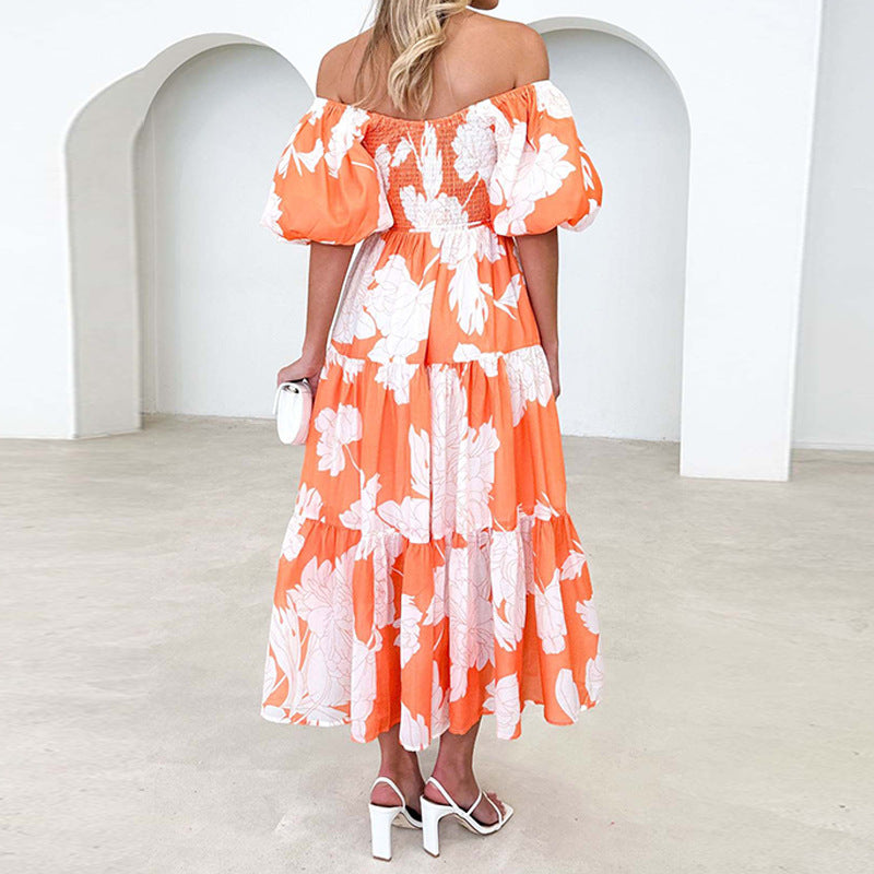 Kvinnors Maxi Klänning med voluminösa puffärmar och blommönster Mirla-Eva Jonsson