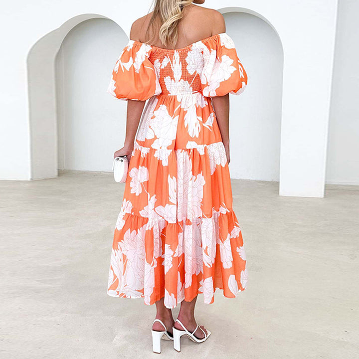 Kvinnors Maxi Klänning med voluminösa puffärmar och blommönster Mirla-Eva Jonsson