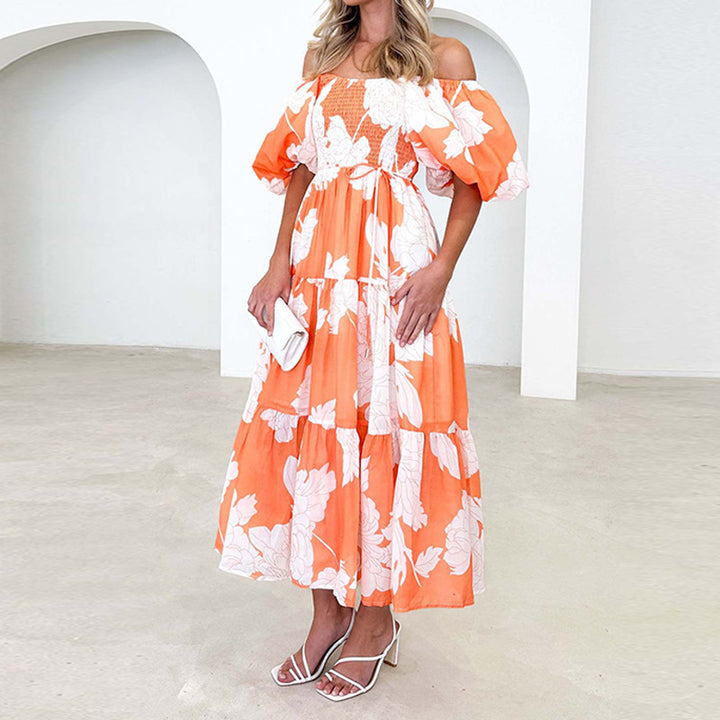 Kvinnors Maxi Klänning med voluminösa puffärmar och blommönster Mirla-Eva Jonsson