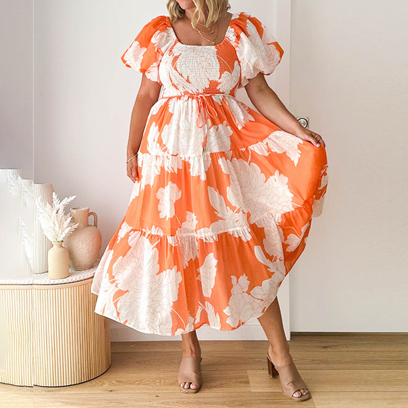 Kvinnors Maxi Klänning med voluminösa puffärmar och blommönster Mirla-Eva Jonsson