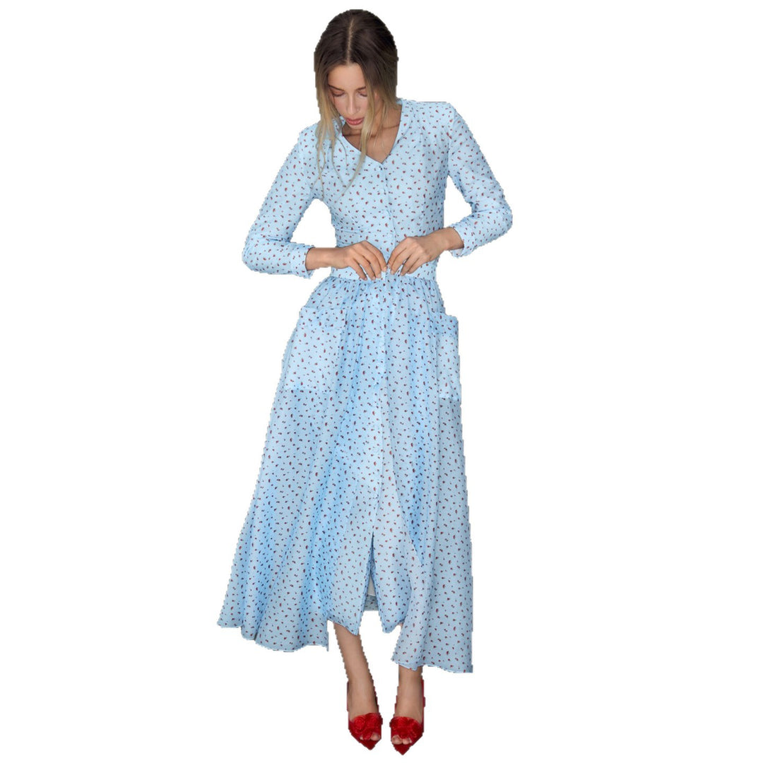 Kvinnors Maxi Silhouetteklänning med Eleganta Volangdetaljer och Knappslå Mirla-Eva Jonsson